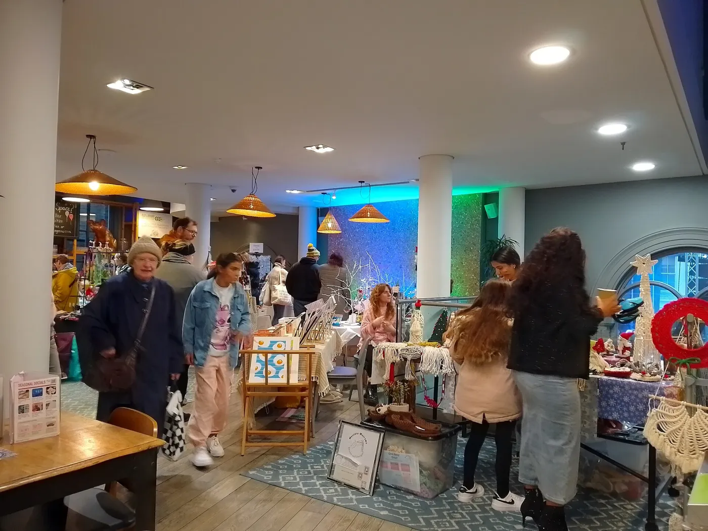 Shoppers browsing craft stalls at the Corn Exchange Christmas Gift Fair in Newbury