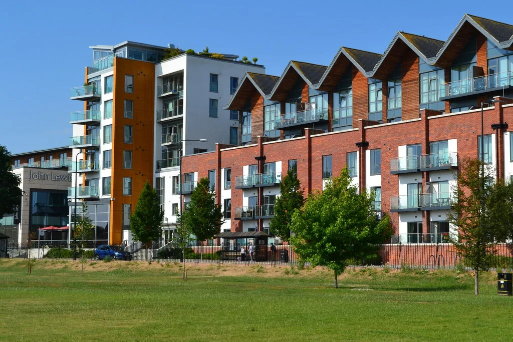 New flats and townhouses beside the Kennet in central Newbury. The median flat in West Berkshire sold for £209,000 over the last twelve months